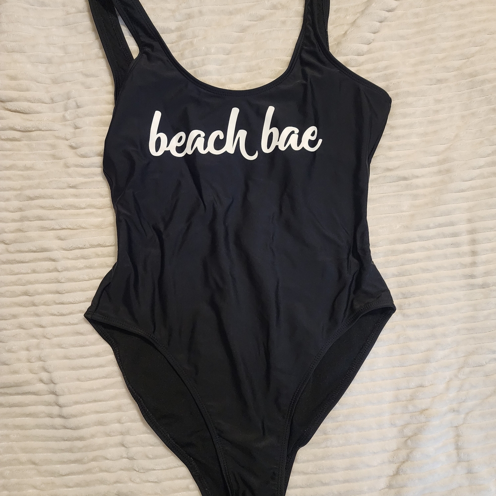 No Boundaries Black One Piece with White Script